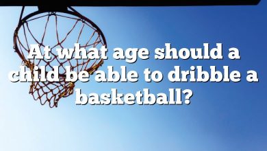 At what age should a child be able to dribble a basketball?