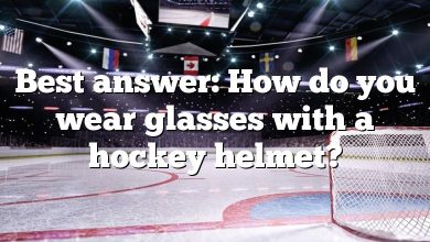 Best answer: How do you wear glasses with a hockey helmet?