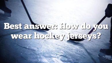 Best answer: How do you wear hockey jerseys?