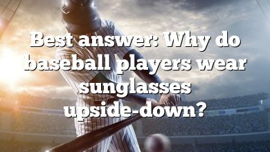 Best answer: Why do baseball players wear sunglasses upside-down?