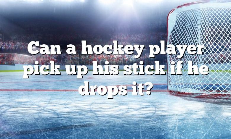 Can a hockey player pick up his stick if he drops it?