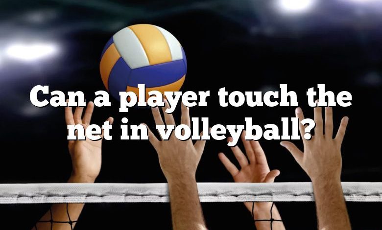 Can a player touch the net in volleyball?