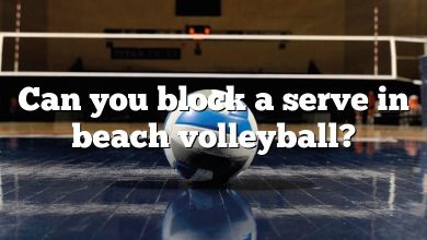 Can you block a serve in beach volleyball?