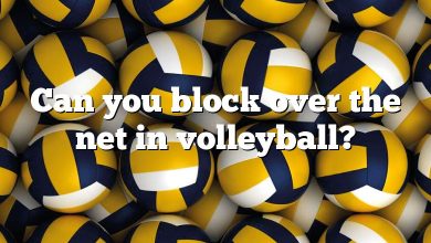 Can you block over the net in volleyball?