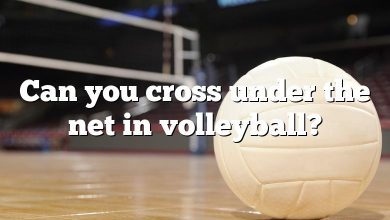 Can you cross under the net in volleyball?