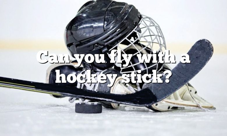 Can you fly with a hockey stick?