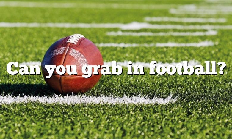 Can you grab in football?