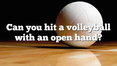 Can you hit a volleyball with an open hand?