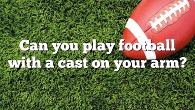 Can you play football with a cast on your arm?