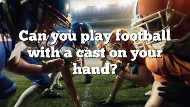 Can you play football with a cast on your hand?