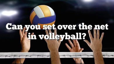 Can you set over the net in volleyball?