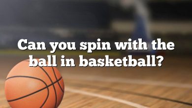 Can you spin with the ball in basketball?