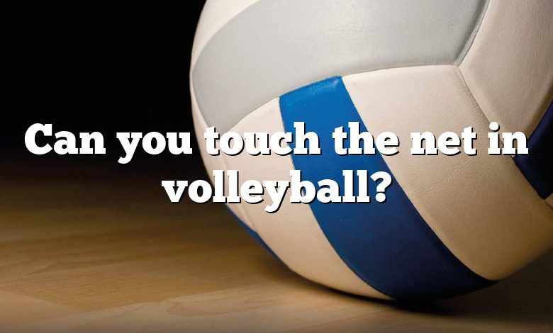 Can you touch the net in volleyball?