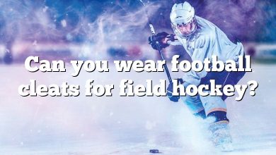 Can you wear football cleats for field hockey?