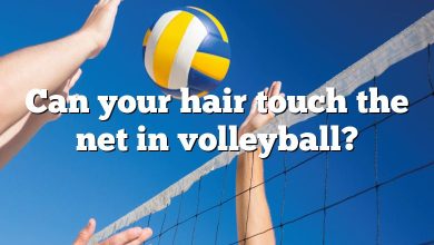 Can your hair touch the net in volleyball?