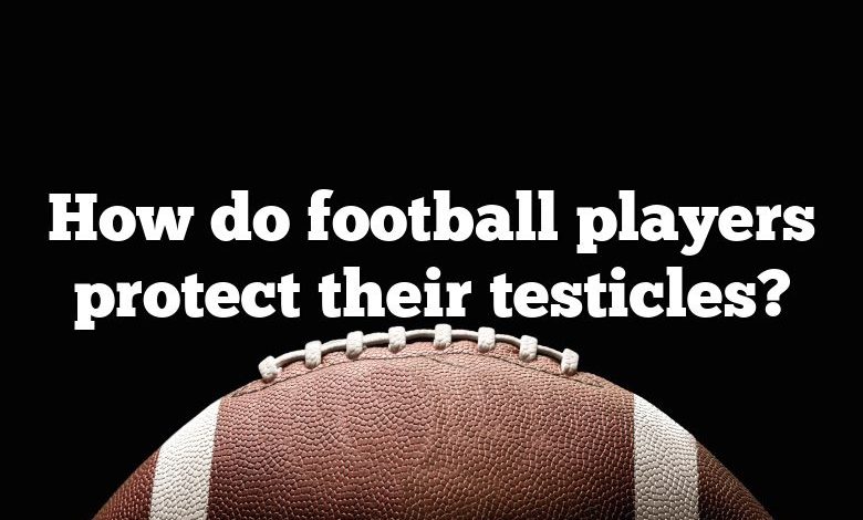 How do football players protect their testicles?