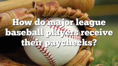 How do major league baseball players receive their paychecks?