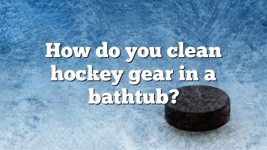 How do you clean hockey gear in a bathtub?