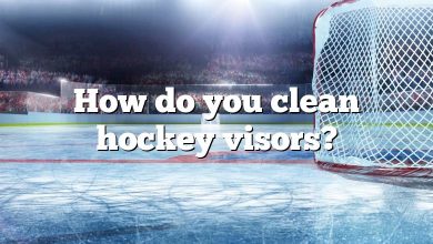 How do you clean hockey visors?