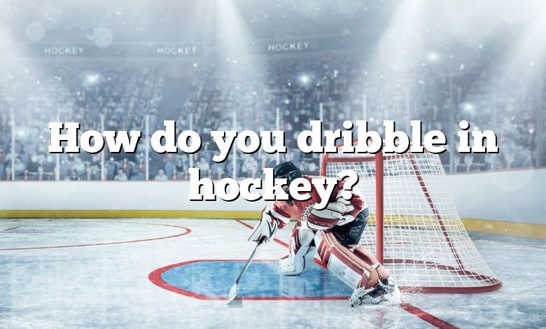 How do you dribble in hockey?