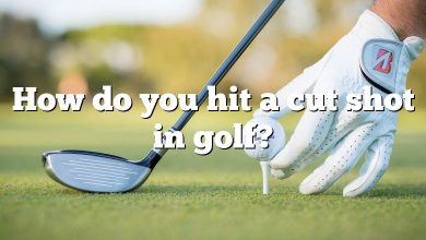 How do you hit a cut shot in golf?