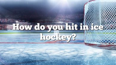 How do you hit in ice hockey?