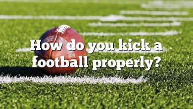 How do you kick a football properly?