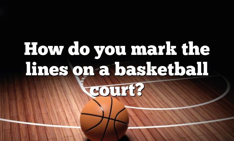 How do you mark the lines on a basketball court?