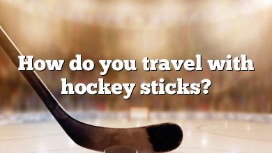 How do you travel with hockey sticks?