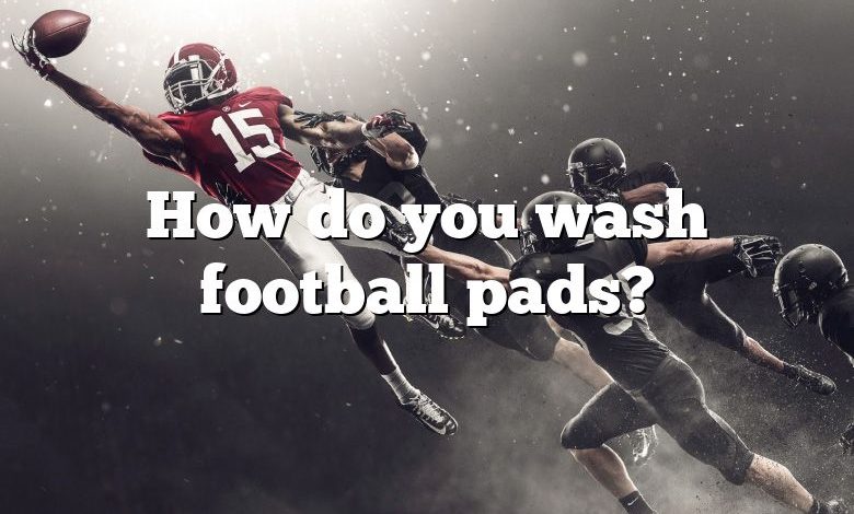 How do you wash football pads?