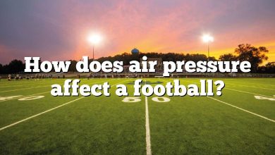 How does air pressure affect a football?