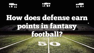 How does defense earn points in fantasy football?