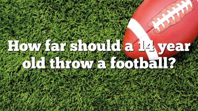 How far should a 14 year old throw a football?