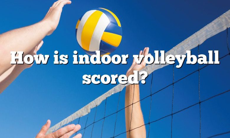 How is indoor volleyball scored?