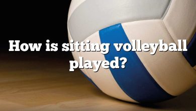 How is sitting volleyball played?