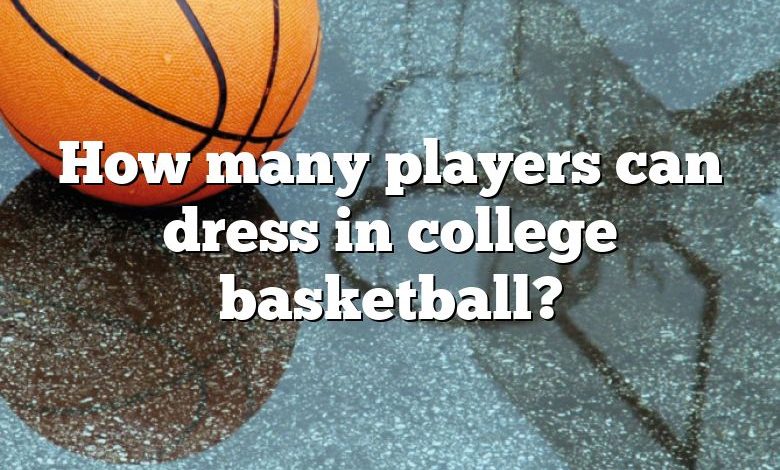 How many players can dress in college basketball?