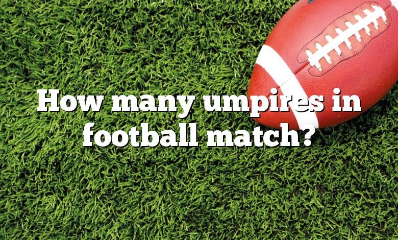 How many umpires in football match?