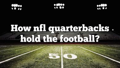 How nfl quarterbacks hold the football?