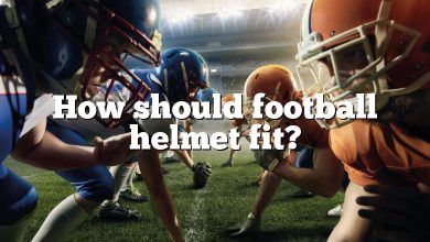 How should football helmet fit?