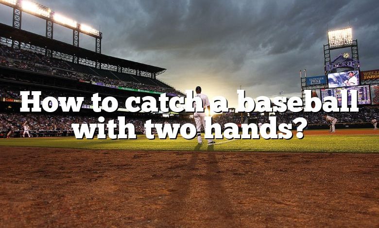 How to catch a baseball with two hands?