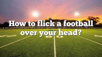 How to flick a football over your head?