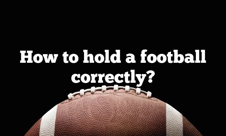 How to hold a football correctly?