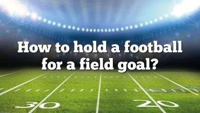 How to hold a football for a field goal?