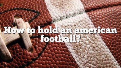 How to hold an american football?