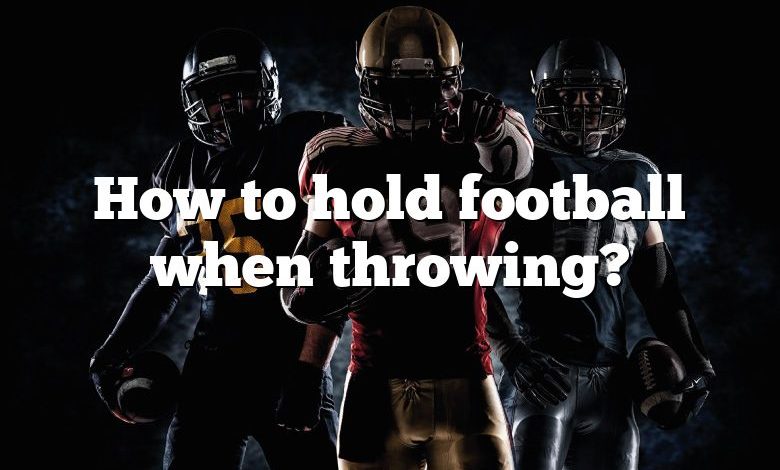 How to hold football when throwing?