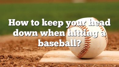 How to keep your head down when hitting a baseball?