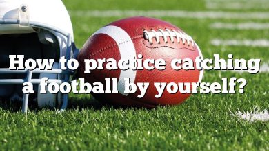 How to practice catching a football by yourself?