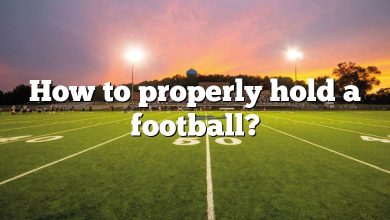 How to properly hold a football?