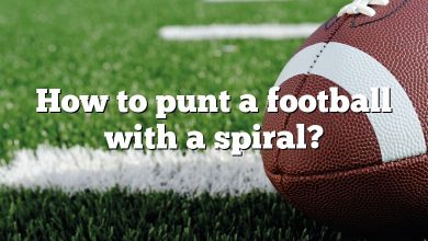 How to punt a football with a spiral?