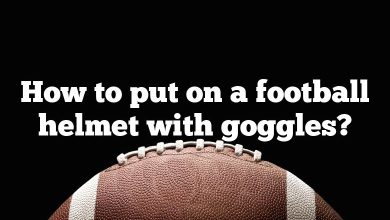 How to put on a football helmet with goggles?